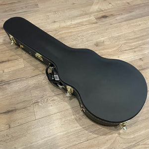 V-Case Les Paul shaped. Heavy duty plywood covered in black vinyl